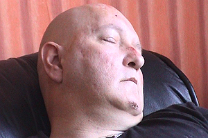 Karen cares for Muhammad and regularly comes home to find him slumped on the floor asleep.