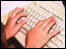 hands on a keyboard