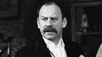 Black and white photograph of Emrys James