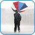 Man with umbrella in storm