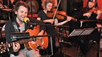 Fyfe Dangerfield performs on Simon Mayo's show with violinists.