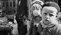 Two young French refugees fleeing the German advance into France