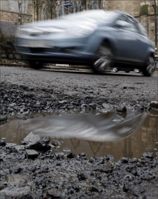 Pothole in road