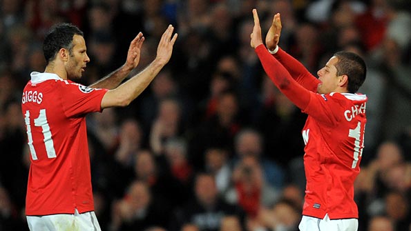 Giggs and Hernandez celebrate after the latter had opened the scoring. Photo: AFP