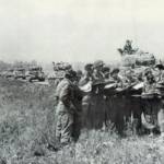 Tank Commanders of the 1st Polish Armoured Division, receive battle orders Falaise, 17th August 1944. Mietek Herman fourth from left. Tank Commanders of the 1st Polish Armoured Division, receive battle orders Falaise, 17th August 1944. Mietek Herman fourth from left.