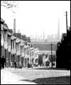 cobbled street and terraced houses