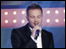 A member of Westlife singing on a TV show